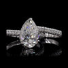 Dazzle in Timeless Beauty with this Pear-shaped Diamond Ring Pair