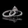 Dazzle in Timeless Beauty with this Pear-shaped Diamond Ring Pair